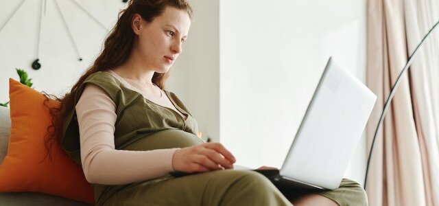 pregnant woman working remotely facing pregnancy discrimination