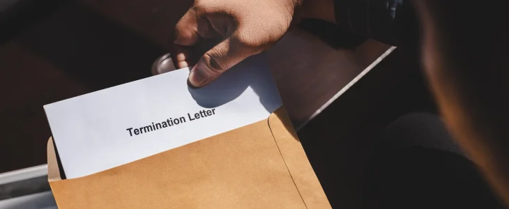 Man receiving a termination letter in Rhode Island